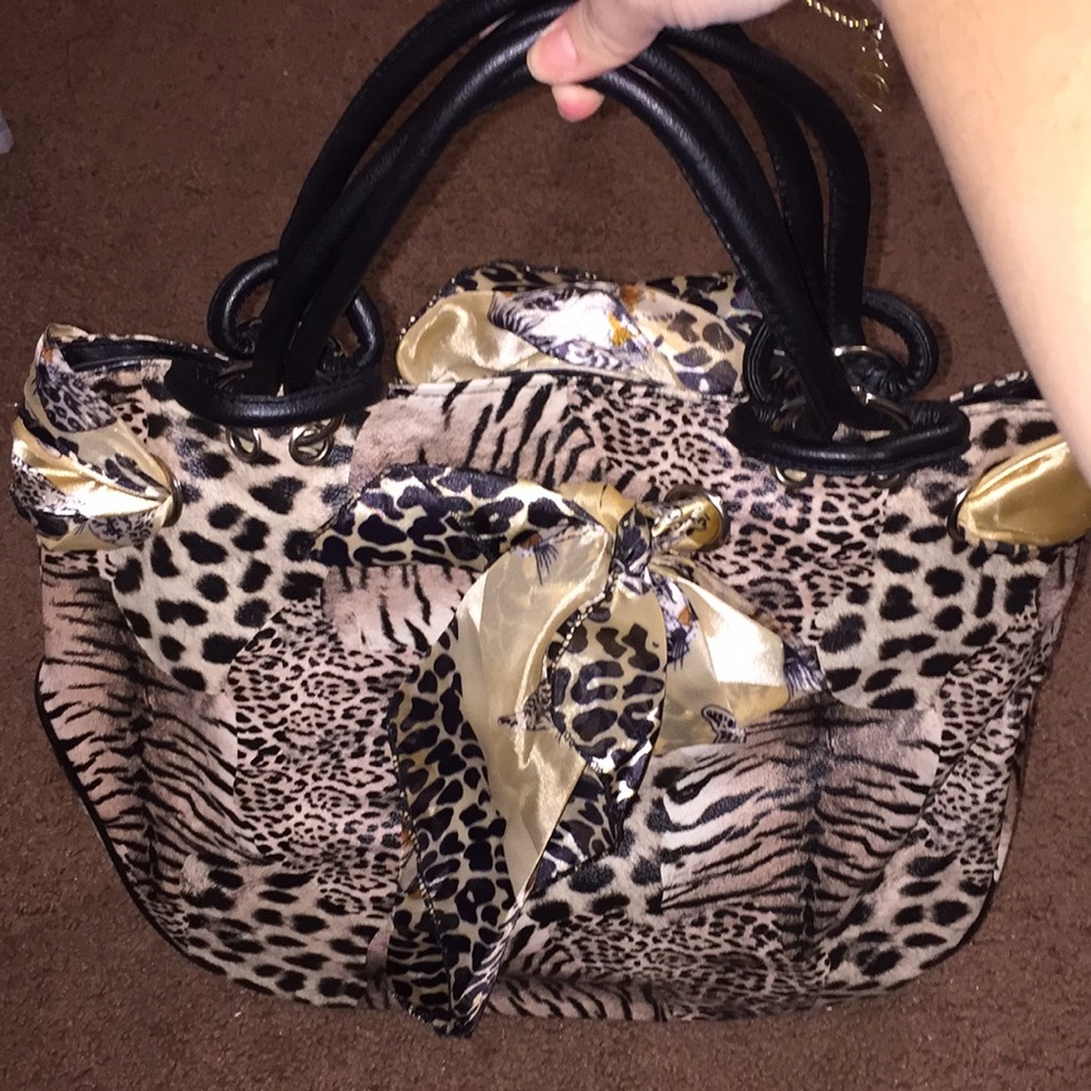 Aldo faux leather leopard purse.